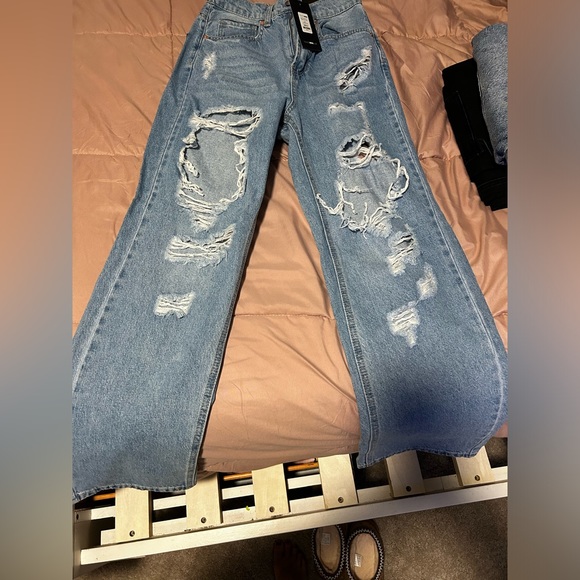 6 pairs of fashion nova jeans never worn with the tags still on. - Picture 2 of 6